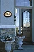 Elegant house numbers in cast aluminum, bronze, brass and more. Lighted house plaques come in a variety of shapes and colors.