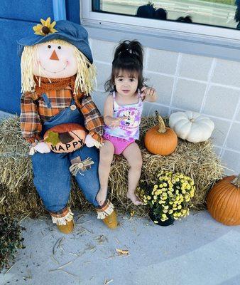 Pumpkins in the entry of the swim arena