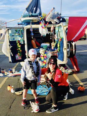 Shark rescue hat on boy; shirt on me so you can see the logo on the sleeve