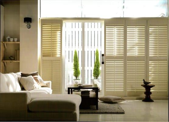 Sunburst Shutters & Window Fashions
