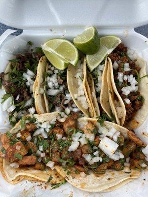 Al pastor, carne asada, and chorizo tacos