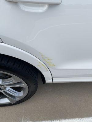 This happened at the car parking lot when the manager pull me onto the ground