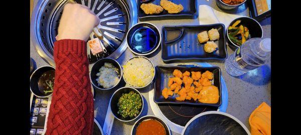 Popcorn shrimp, shumai (half eaten already) chilli and various spices