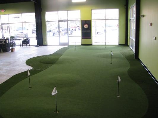 650 sq. foot undulated puting green. Great for chipping too!