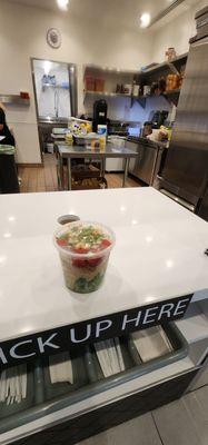 Poke bowl with coconut flavor rice. Layered.