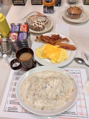 1/2 order biscuits and gravy with eggs and cheese and bacon coffee is good