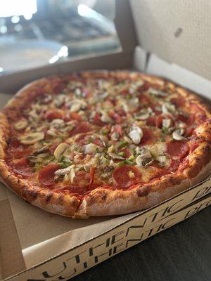 The works! The pizza crust was great and had a few bubble which everyone fights over.