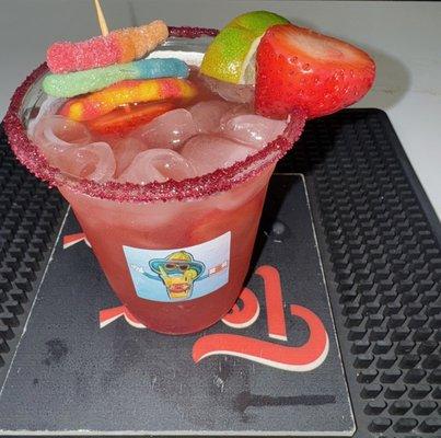 "Sip the vibe. Taste the flavor. Our signature strawberry on rocks hit different at HoM.  #HausOfMargaritaz"