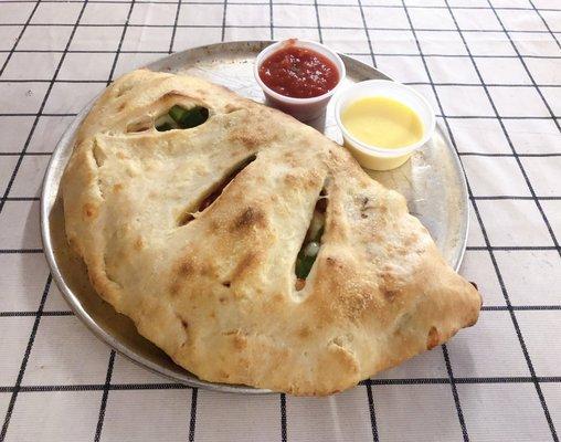 This! Is the small calzone! Bring your friends plenty to share.