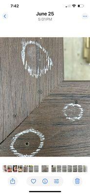 Damaged composite railing and missing screw.