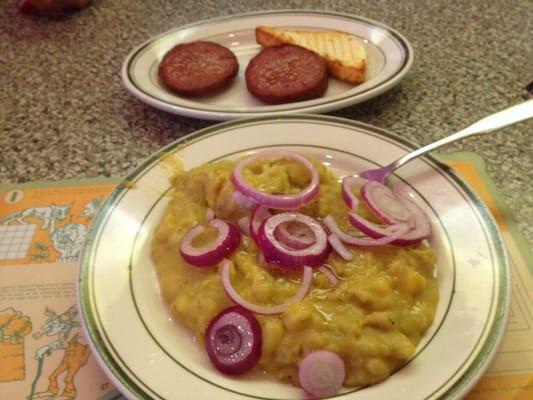 This is called "two hits with mangu "which is mashed plantains Dominican salami and fried cheese..delicious