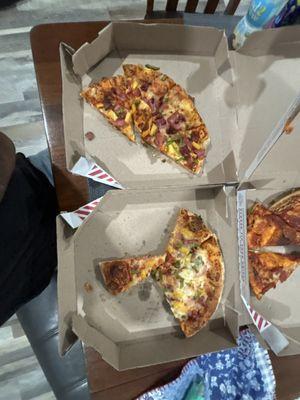 One reheated Hawaiian pizza, and one fresh pizza from the same order