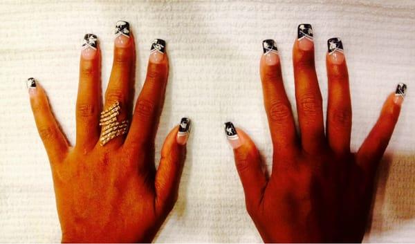 My fill & design by Envy Nail Spa. Very happy. Custom design, all done by hand & a toothpick! No cleanup with remover required!