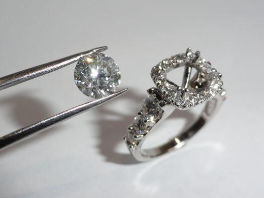 We changed the HALO in our stock ring to fit this 3ct. round diamond...