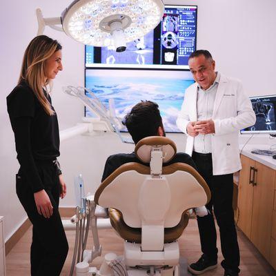 Dr. Eliasian consulting with a patient.