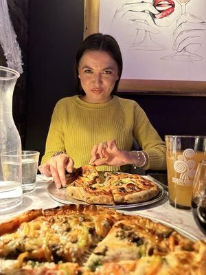 Pizza in a bar unrelated to the restaurant