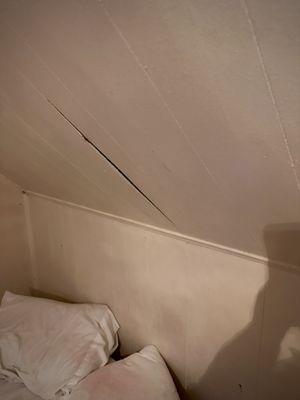 Ceiling separating above bed
