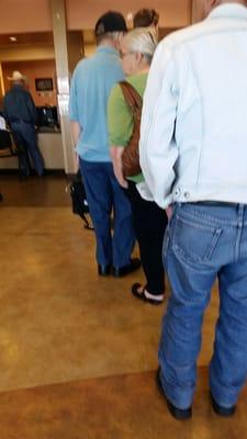 2 at counter, 6 in line. Typical for this CBOC. Needs a bigger space & more staff.