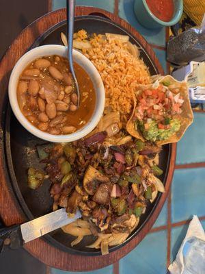 I got the chicken paridilla (I believe that's what it's called). Super juicy chicken! The rice is out of this world delicious!!