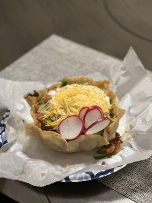 Taco Salad, your choice of meat, cheese, sour cream, beans, rice, lettuce. This was loaded with the Al Pastor I chose.