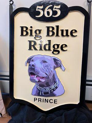 This is a digital rendering done by Jeannette at VirgoDesignStudio.com. Then applied to a background routed sign with hanging side straps