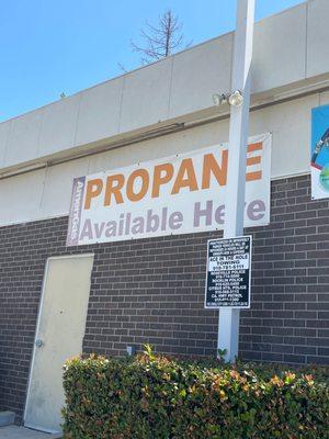 "Propane available here" sign