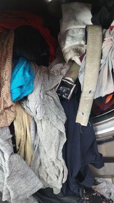 My clothes that weren't cleaned because the conveyor belt wasn't working and their was no water coming out!!