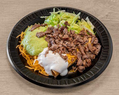 carne asada rolled tacos
carne asada
cheese
sour cream
guacamole
lettuce