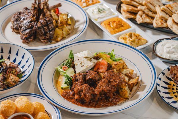 Beef stew plate , lamb chops , dips
