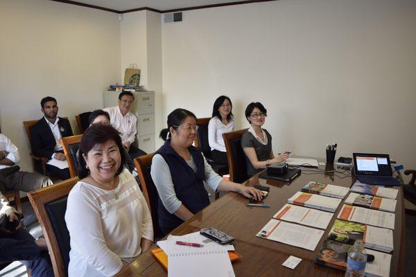 At a Mary Wong Financial Seminar ... a guest speaker is presenting.