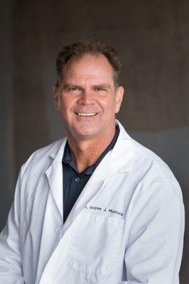 Dr. Andrew J. Huxford