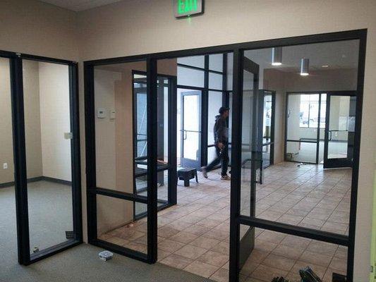 Commercial storefront glass installation.