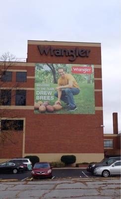 Glad to see a giant picture of Drew Brees on the side of the Wrangler building in Greensboro, NC. Who Dat? Geaux Saints!