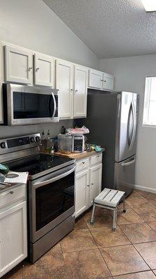 Microwave, stove and refrigerator