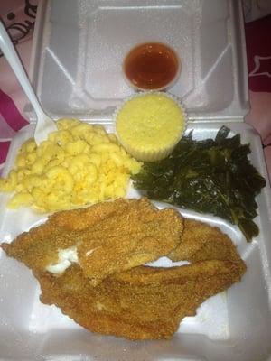 Catfish dinner w/ Mac n cheese and greens YUM! First time here, bought a groupon and I'm glad I did Defiantly will B back.
