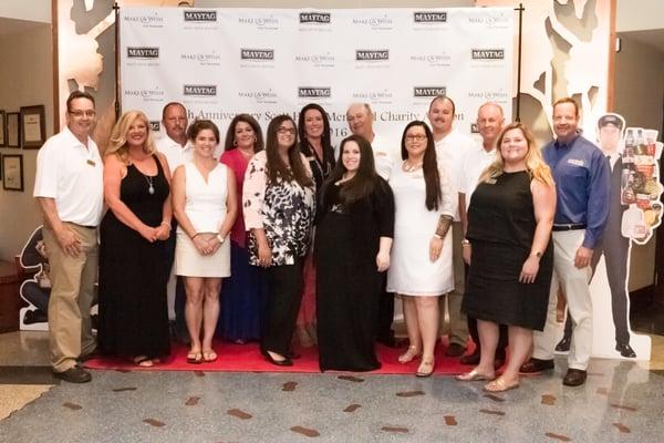 Volunteer team putting on the auction