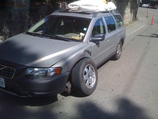 This is my car after the wheel fell off because they didn't attach it properly