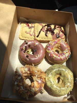 4 amazing doughnut flavors and two (still warm!) pop tarts! Lemon poppyseed is the winner so far! I can't believe these are gluten free.