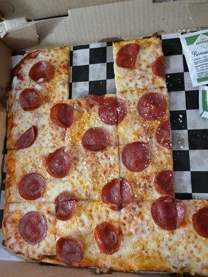 Delicious pepperoni pizza/flatbread.