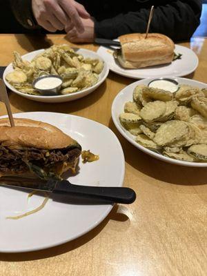 Cheese steak with wayy too much fried pickle chips.