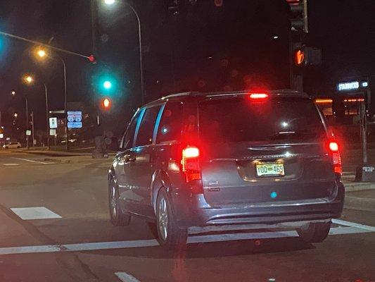 The Pikes Peak Cab that almost hit me. Logo and phone number on driver side.