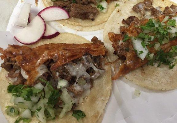 QuesaTacos, more than just cheese on a taco. Our blend of white cheeses browned on a grill and melted into your choice of meat.