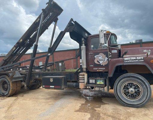 Roll-off container delivery in ACTION!