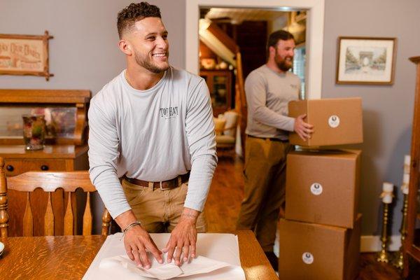Josiah and Austin packing the personal belongings of our client.