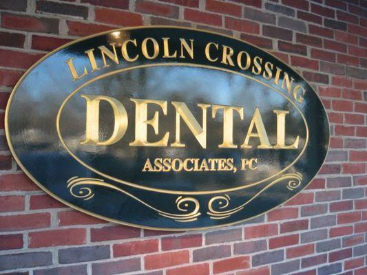 Carved gold leaf lettering