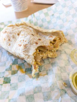 Potato breakfast burrito with glass Mexican coke