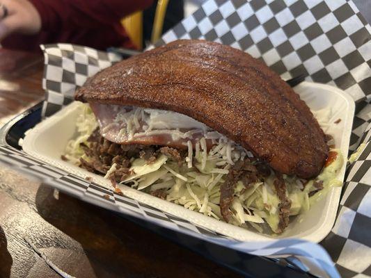 Patacon with carne asada