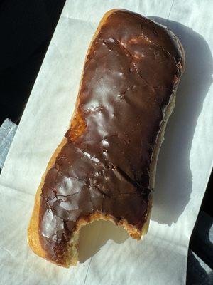Custard filled chocolate bar donut