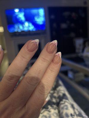 Cutesy bow nail art done by Tina