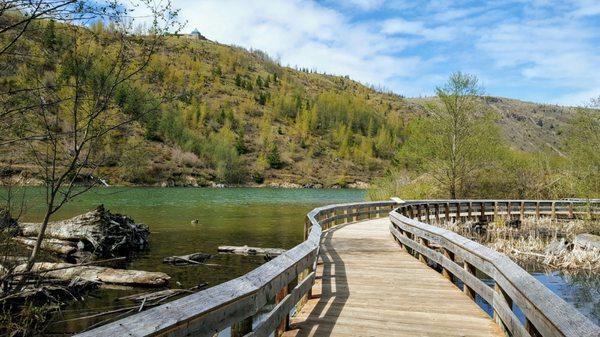 Serpentine board walk on lake